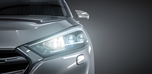 A close-up photo of a car headlight